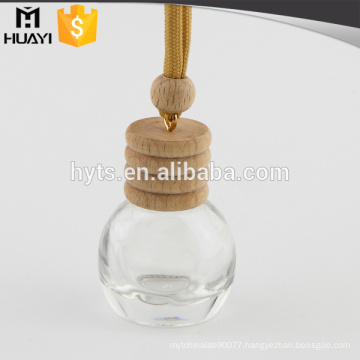 clear glass empty car perfume bottle with hanging rope